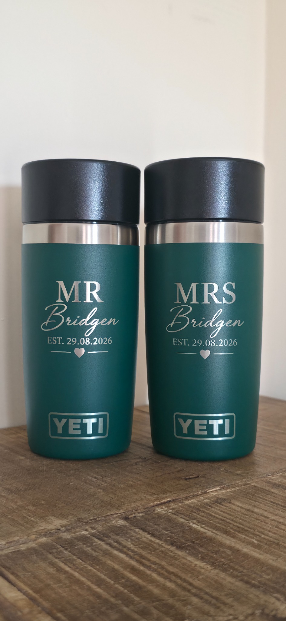 Matching green YETI tumblers engraved for Mr and Mrs Bridgen